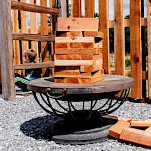 A custom-made Jenga set with carefully crafted wooden blocks, perfect for a personalized and fun gift.
